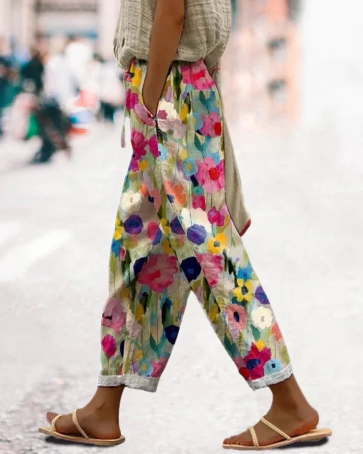 Pantaloni larghi da donna con motivo floreale colorato – Pantaloni estivi leggeri con tasche e vita elasticizzata