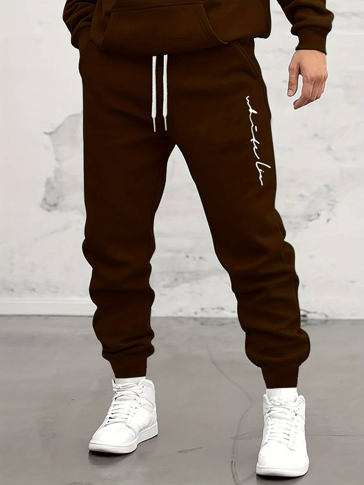 Herren Jogginghose mit Print – Sportliche Sweatpants mit Bündchen & Kordelzug