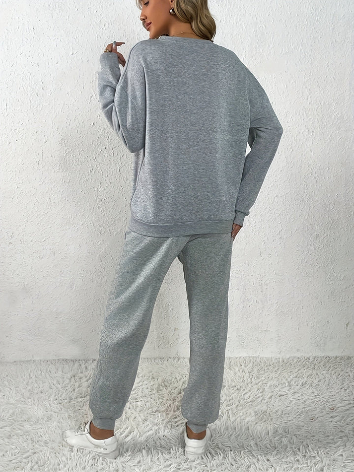 Maglione elegante con scollo rotondo e motivo a cuore & pantaloni da jogging per donna | Ideale per autunno/inverno