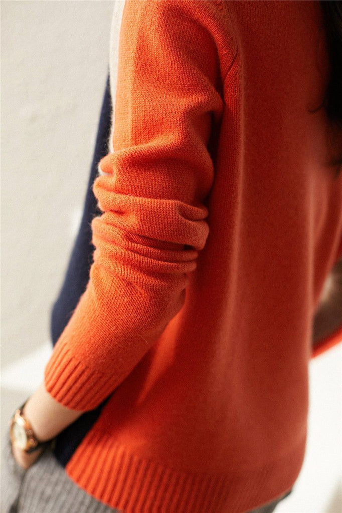 Aquisha | Pull pour femmes avec rayures rétro en marine et orange