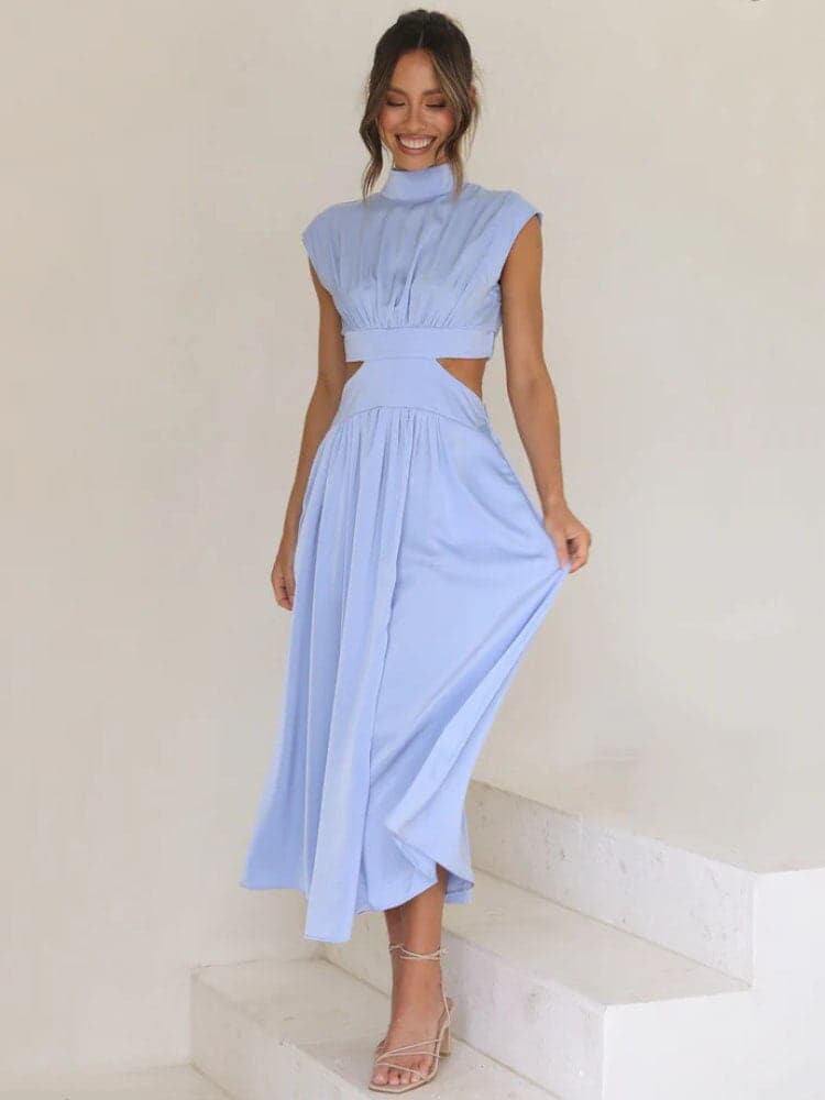 Robe Midi Enchanted Meadow Verte Découpée – Élégance et Modernité au Service de Votre Silhouette