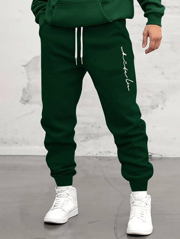 Herren Jogginghose mit Print – Sportliche Sweatpants mit Bündchen & Kordelzug