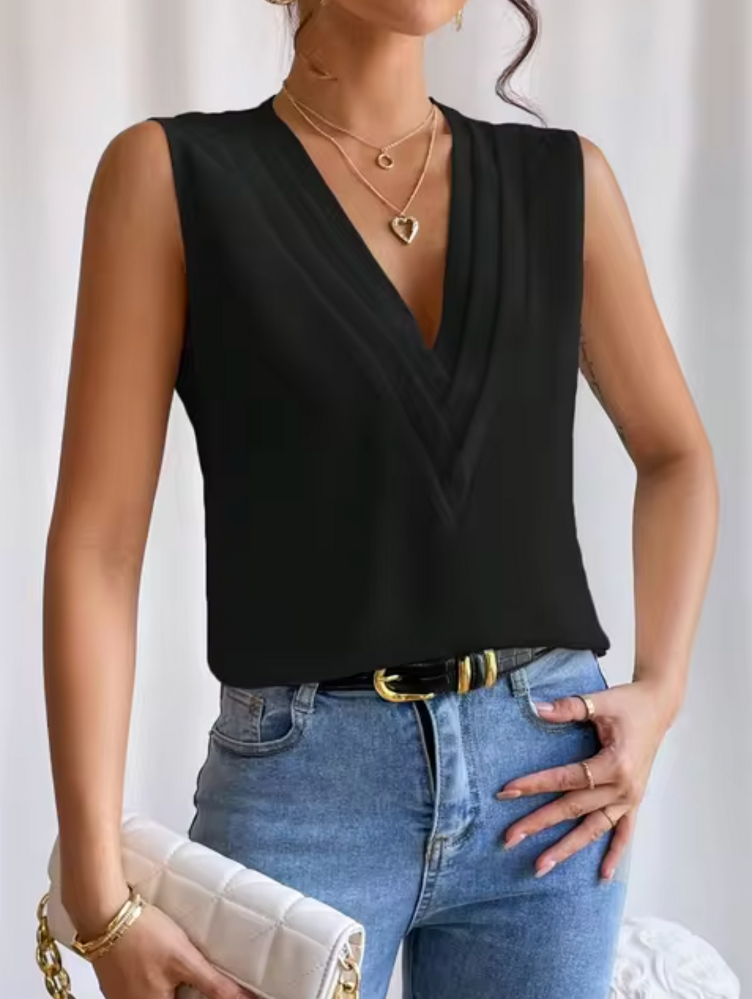 Maddie – Elegante top senza maniche con scollo a V