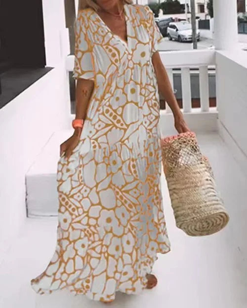 Abito lungo donna con stampa floreale – Abito estivo arioso con scollo a V e maniche corte per vacanze e spiaggia