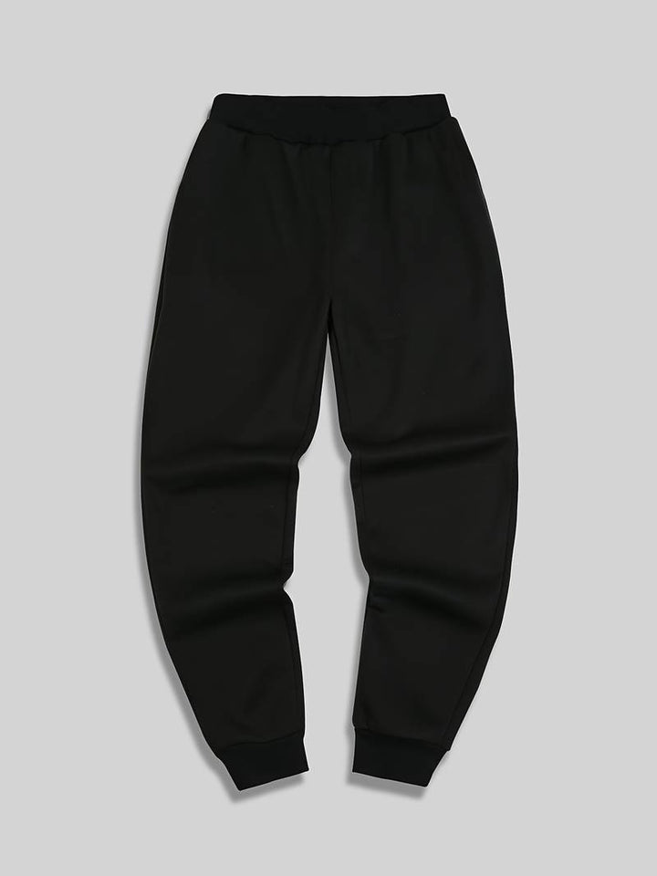 Herren Jogginghose mit Print – Sportliche Sweatpants mit Bündchen & Kordelzug