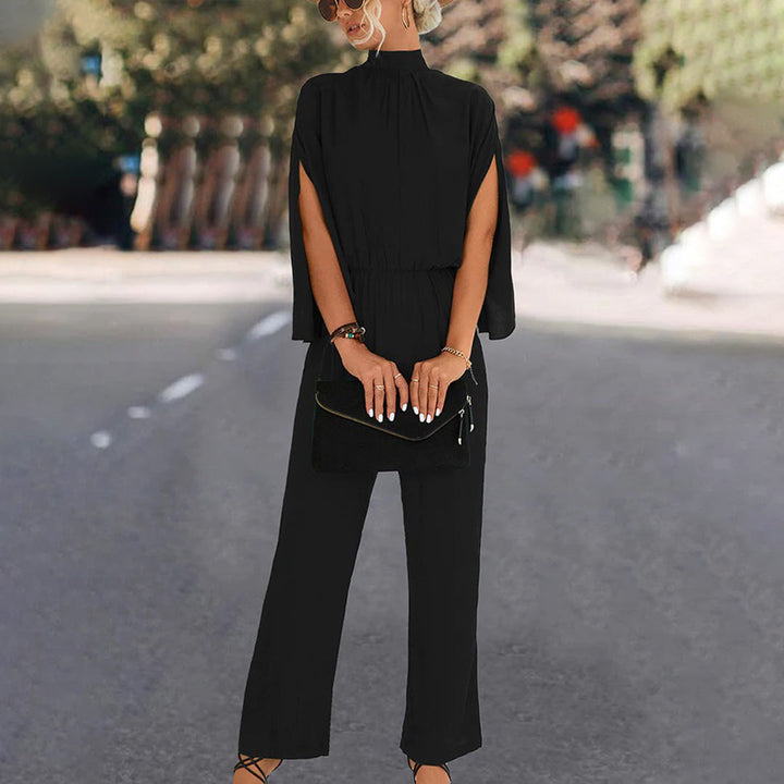 Elegante tuta da donna – tuta estiva con collo alto e maniche con spacco