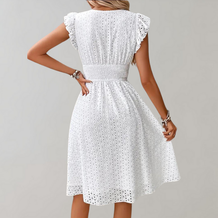 Vestito estivo bianco da donna – Abito senza maniche con ricamo a occhielli e scollo a V per spiaggia e uso quotidiano