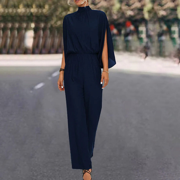 Elegante tuta da donna – tuta estiva con collo alto e maniche con spacco
