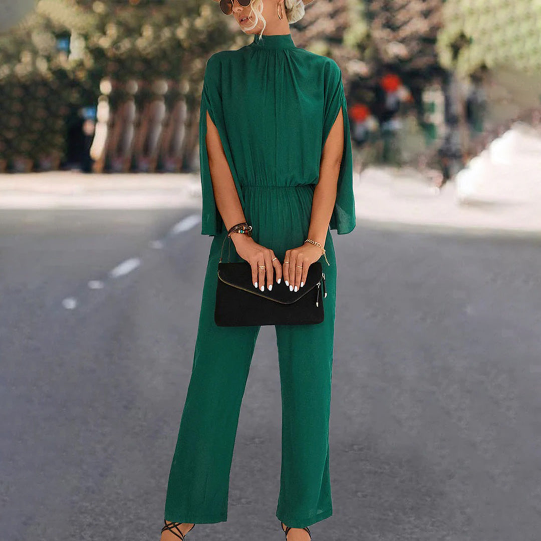 Elegante tuta da donna – tuta estiva con collo alto e maniche con spacco