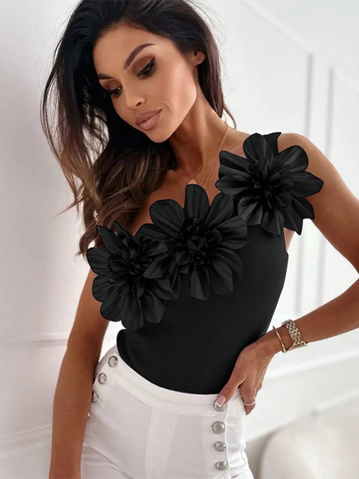 Top à une épaule avec fleurs
