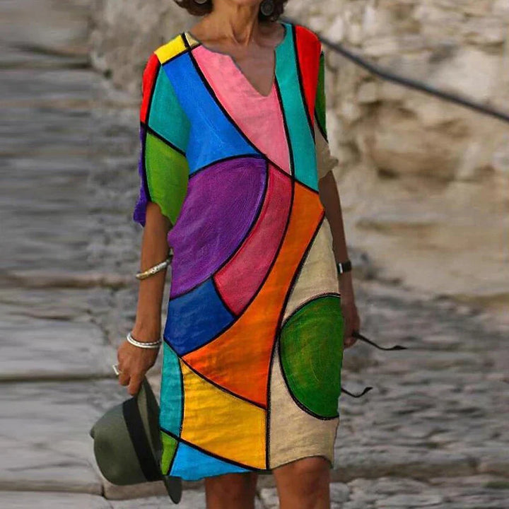 Abito estivo casual con motivo floreale ad acquerello e scollo a V – Comodo abito da tempo libero per spiaggia, vacanza e vita quotidiana