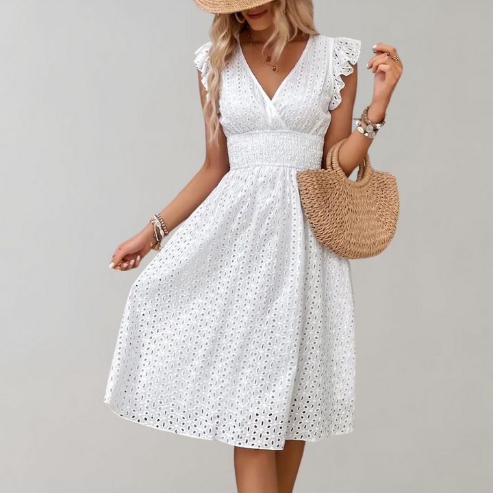 Vestito estivo bianco da donna – Abito senza maniche con ricamo a occhielli e scollo a V per spiaggia e uso quotidiano