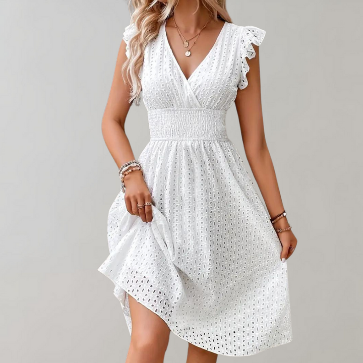 Vestito estivo bianco da donna – Abito senza maniche con ricamo a occhielli e scollo a V per spiaggia e uso quotidiano