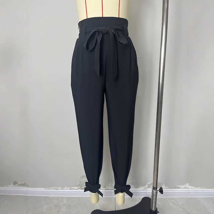 Pantaloni chino eleganti da donna con cintura annodata e polsini larghi