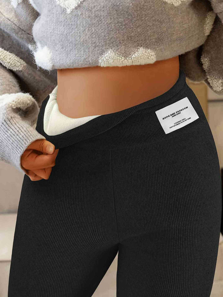 Leggings a coste di alta qualità da donna con vita alta e design decorativo