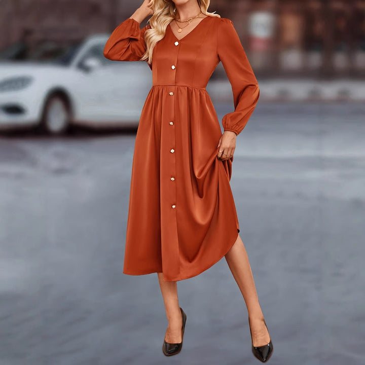 Abito midi da donna con eleganti dettagli a bottoni e rifiniture raffinate sulle maniche
