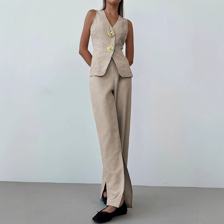 Ensemble elegante da donna composto da blazer senza maniche e pantaloni ampi