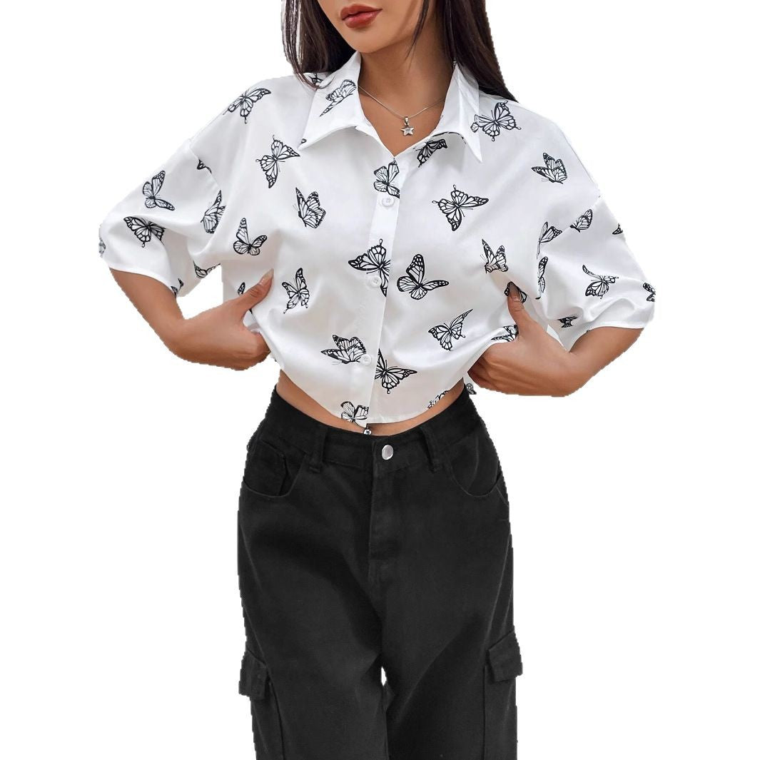 Women's short-sleeve blouse with modern butterfly pattern