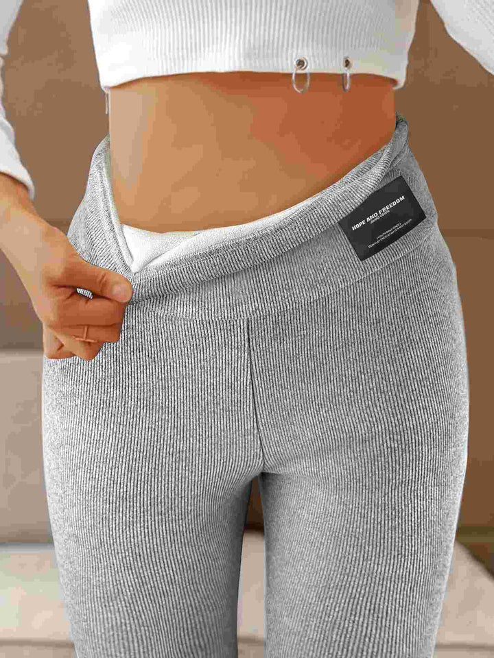 Leggings a coste di alta qualità da donna con vita alta e design decorativo