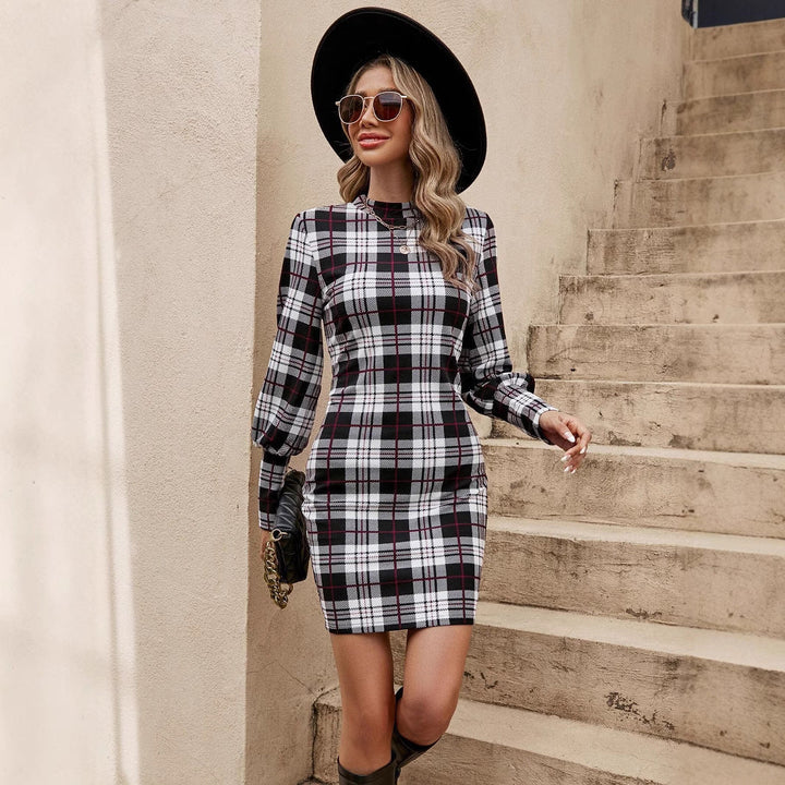 Women's mini dress in a modern check pattern with a trendy waist belt and elegant puff sleeves