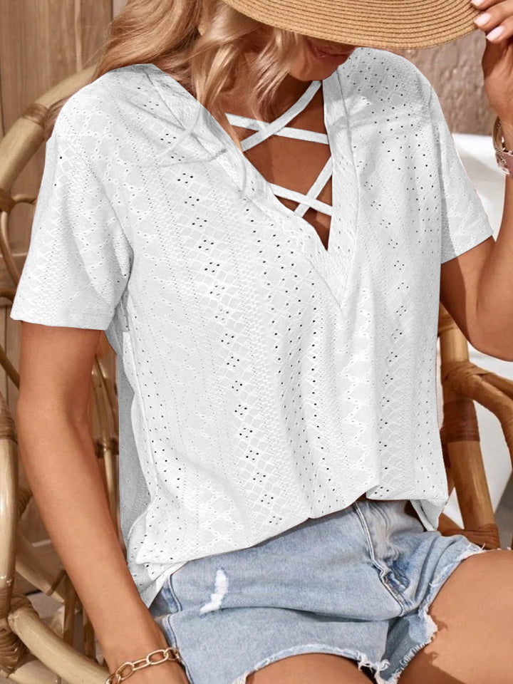 Top da donna con dettagli artistici a ritaglio