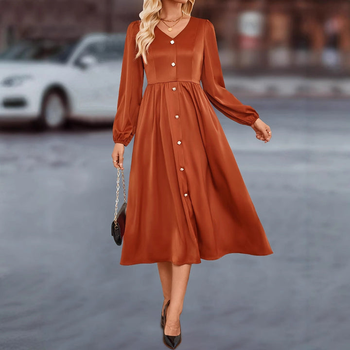 Abito midi da donna con eleganti dettagli a bottoni e rifiniture raffinate sulle maniche