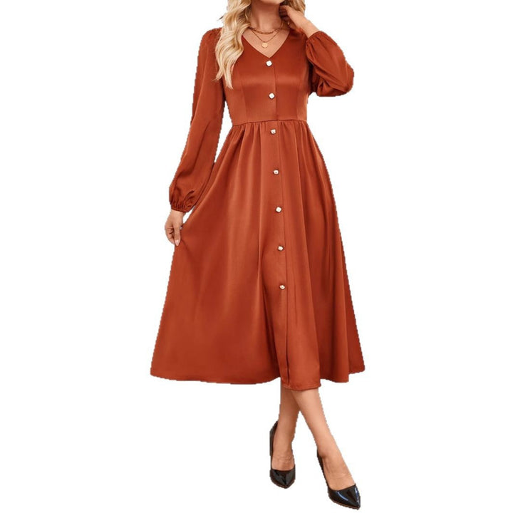 Abito midi da donna con eleganti dettagli a bottoni e rifiniture raffinate sulle maniche
