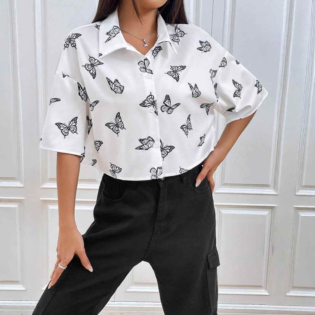 Women's short-sleeve blouse with modern butterfly pattern