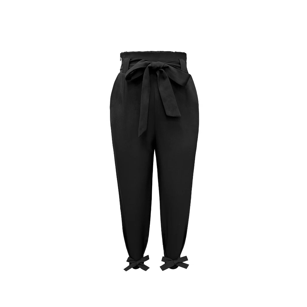 Pantaloni chino eleganti da donna con cintura annodata e polsini larghi