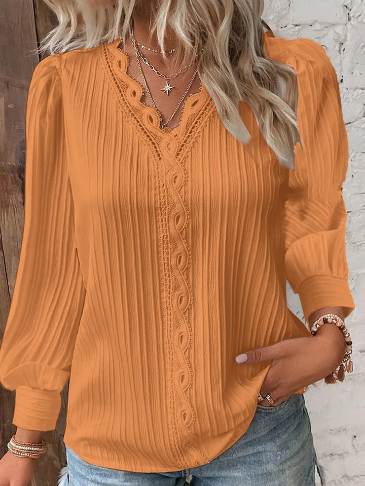 Camicetta da donna con pizzo e scollo a V – elegante e ariosa per tutti i giorni e l'ufficio