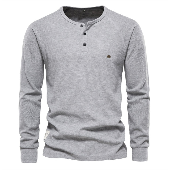 Maglione elegante con bottoni