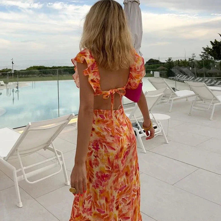 Abito estivo lungo con volant – Abito lungo femminile con motivo tropicale e scollo a V
