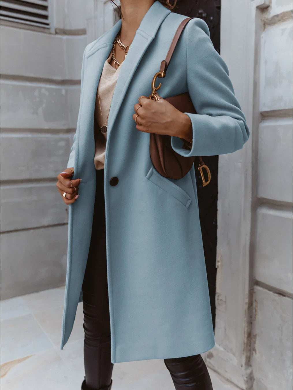 Cappotto lungo con rever e bottone