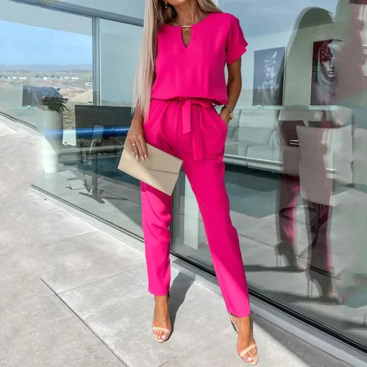 Tuta da donna con cintura – elegante capo unico con scollo a V e vestibilità sagomata