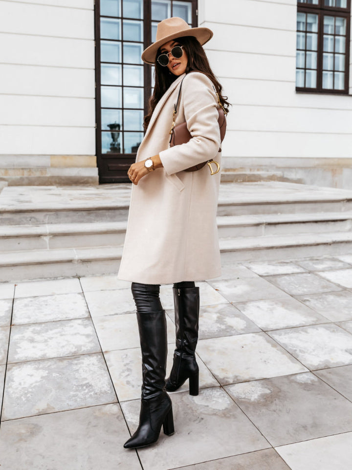 Cappotto lungo con rever e bottone