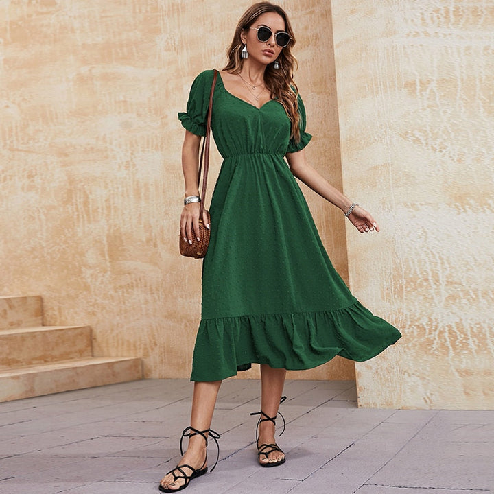 Vestito verde con balza