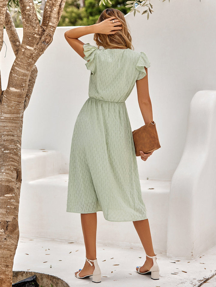 Hellgrünes Midikleid mit V-Ausschnitt