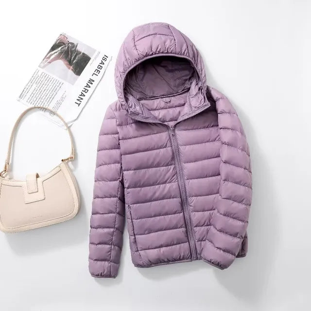 Clarissa - Les nouveaux manteaux en duvet ultralégers et compressibles avec capuche