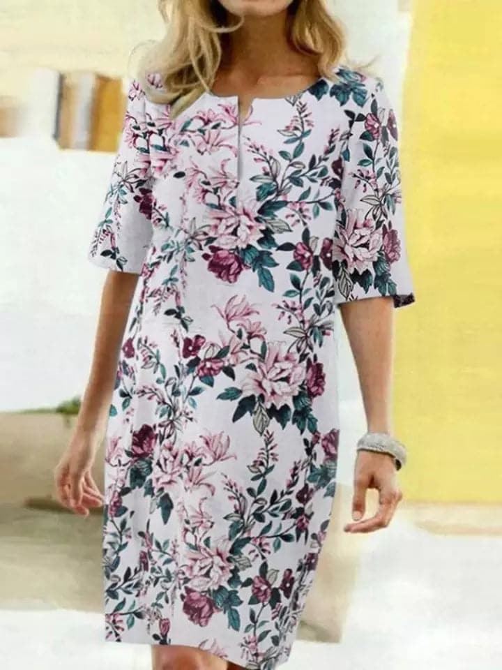 Robe midi botanique vibrante – coupe confortable, manches mi-longues, décolleté rond