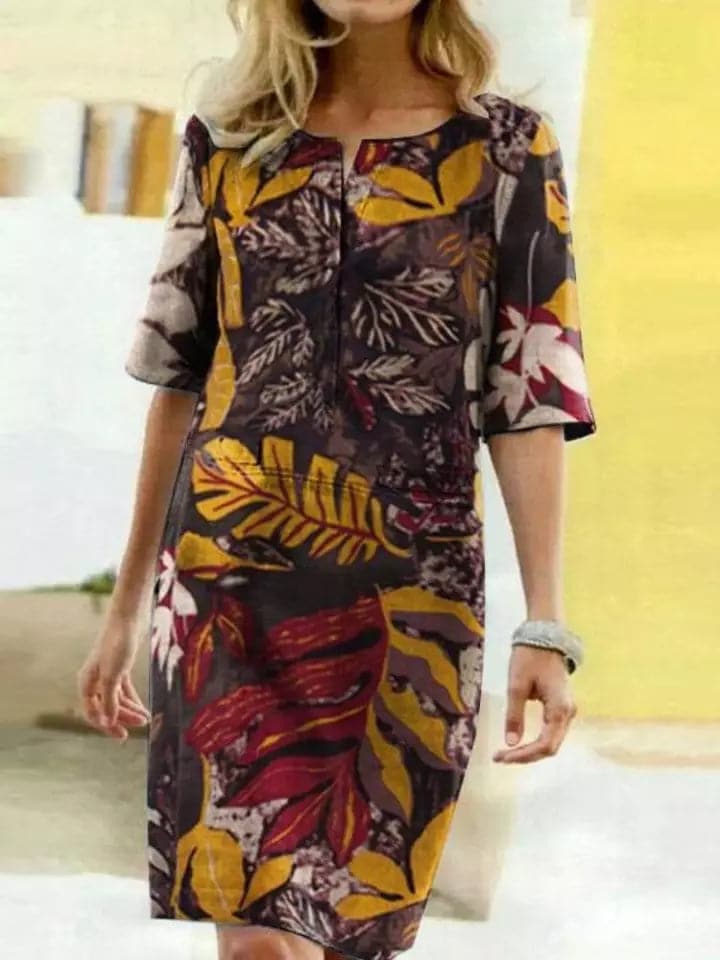 Robe midi botanique vibrante – coupe confortable, manches mi-longues, décolleté rond