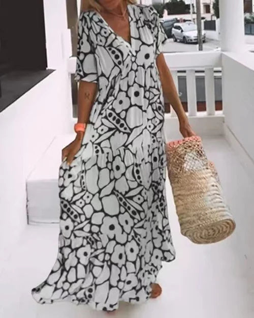 Abito lungo donna con stampa floreale – Abito estivo arioso con scollo a V e maniche corte per vacanze e spiaggia