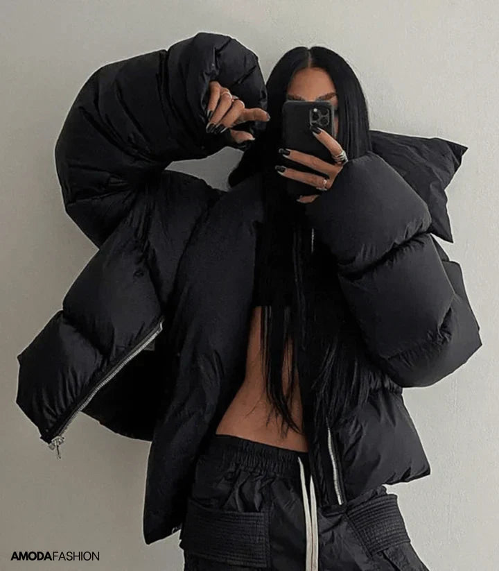 Piumino oversize con collo alto