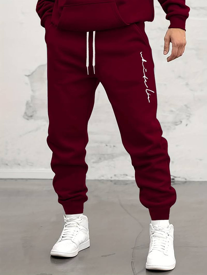 Herren Jogginghose mit Print – Sportliche Sweatpants mit Bündchen & Kordelzug