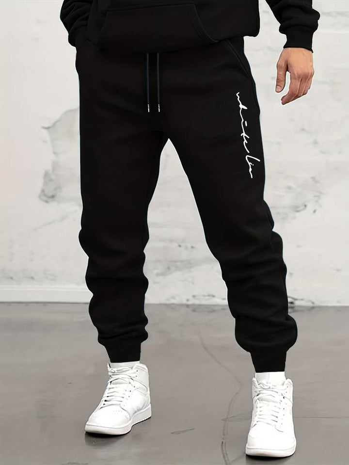 Herren Jogginghose mit Print – Sportliche Sweatpants mit Bündchen & Kordelzug