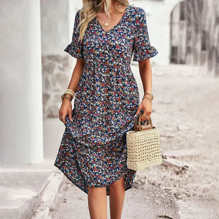 Abito floreale da donna con scollo a V – abito estivo arioso di lunghezza midi con maniche corte