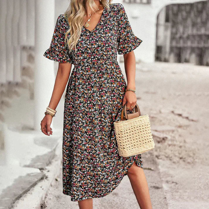 Abito floreale da donna con scollo a V – abito estivo arioso di lunghezza midi con maniche corte