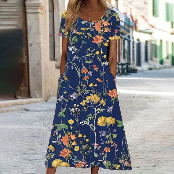 Robe Midi Élégance Fleurie – Une Symphonie de Fleurs et de Mode