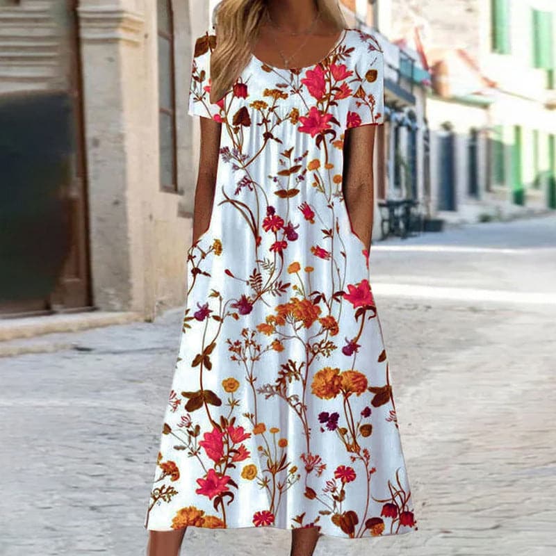Robe Midi Élégance Fleurie – Une Symphonie de Fleurs et de Mode
