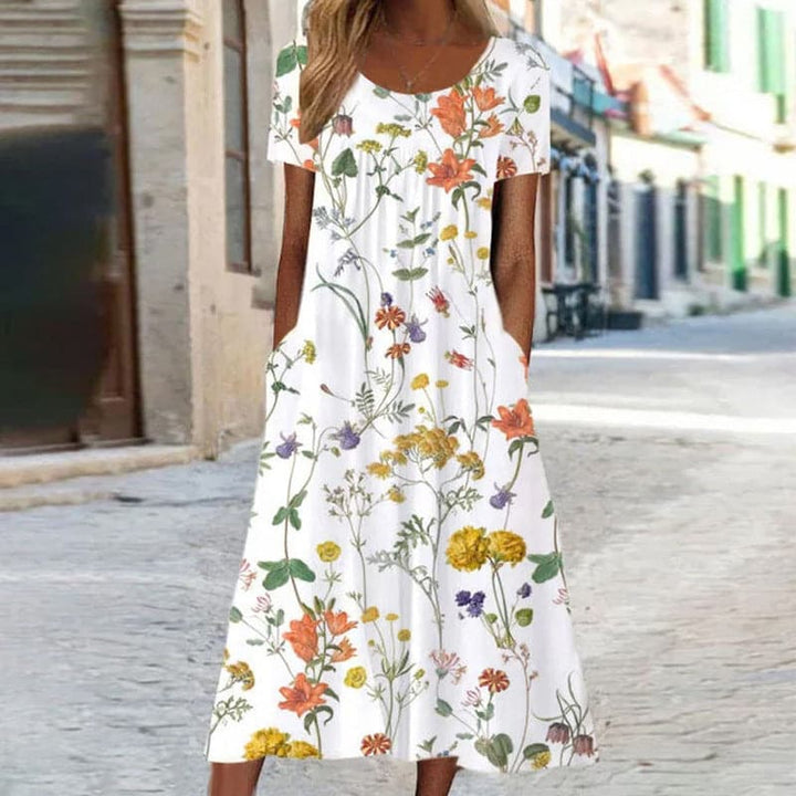 Robe Midi Élégance Fleurie – Une Symphonie de Fleurs et de Mode