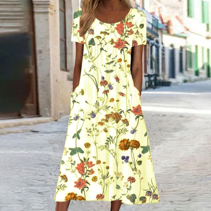 Robe Midi Élégance Fleurie – Une Symphonie de Fleurs et de Mode